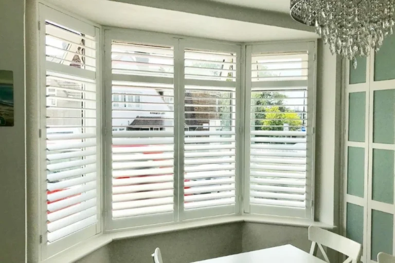 Plantation shutters for bay windows