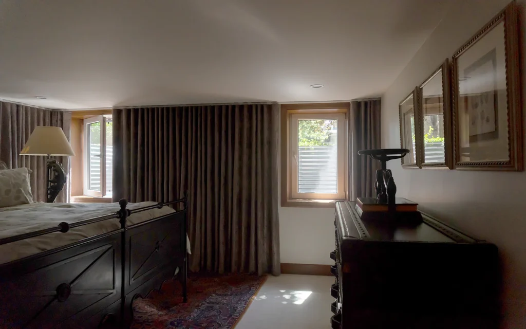 Describes the image succinctly while including the primary keyword, "basement windows.